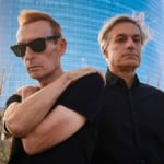 LA CRUS IN CONCERTO May be an image of 2 people