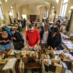 Mantova Libri Mappe Stampe XI ed. May be an image of 10 people, book and crowd