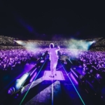 Nino D’Angelo – I miei meravigliosi anni ’80 Estate 2025 May be an image of 1 person and crowd