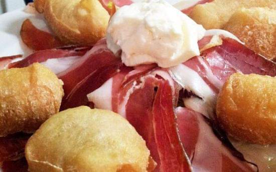 Festa delle Ficattole con Crudo e Stracchino + Vino illimitato May be an image of baguette, mozzarella and text