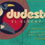 DUDESTOCK 2025 Festival non convenzionale di Musica, Arte e Contest improbabili Potrebbe essere un'immagine raffigurante il seguente testo "PESTIVAL NON CONVENZIOHALEDI ALE DI MUSICA ARIE AR E CONTESI IMDROBABILI Judestock 21 GIUGNO 2025 品 MASTRI DEL LAGO I PARCO TECNOLOGICO DEL LAGO MAGGIORE VERBANIA"