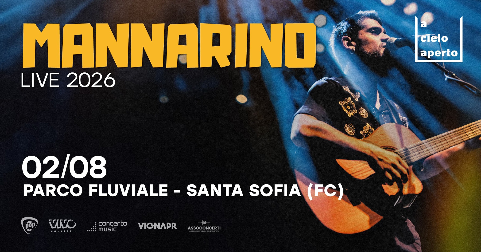 Potrebbe essere un'immagine raffigurante chitarra e il seguente testo "MANNARIND LIVE 2026 a a cielo aperto 02/08 PARCO FLUVIALE pop DoP VINO CONCURTI arI concerto music SANTA SOFIA (FC) VIGNAPR ASSOCONCERTI"