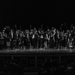 Orchestra La Nota in Più Potrebbe essere un'immagine in bianco e nero raffigurante clarinetto e flauto
