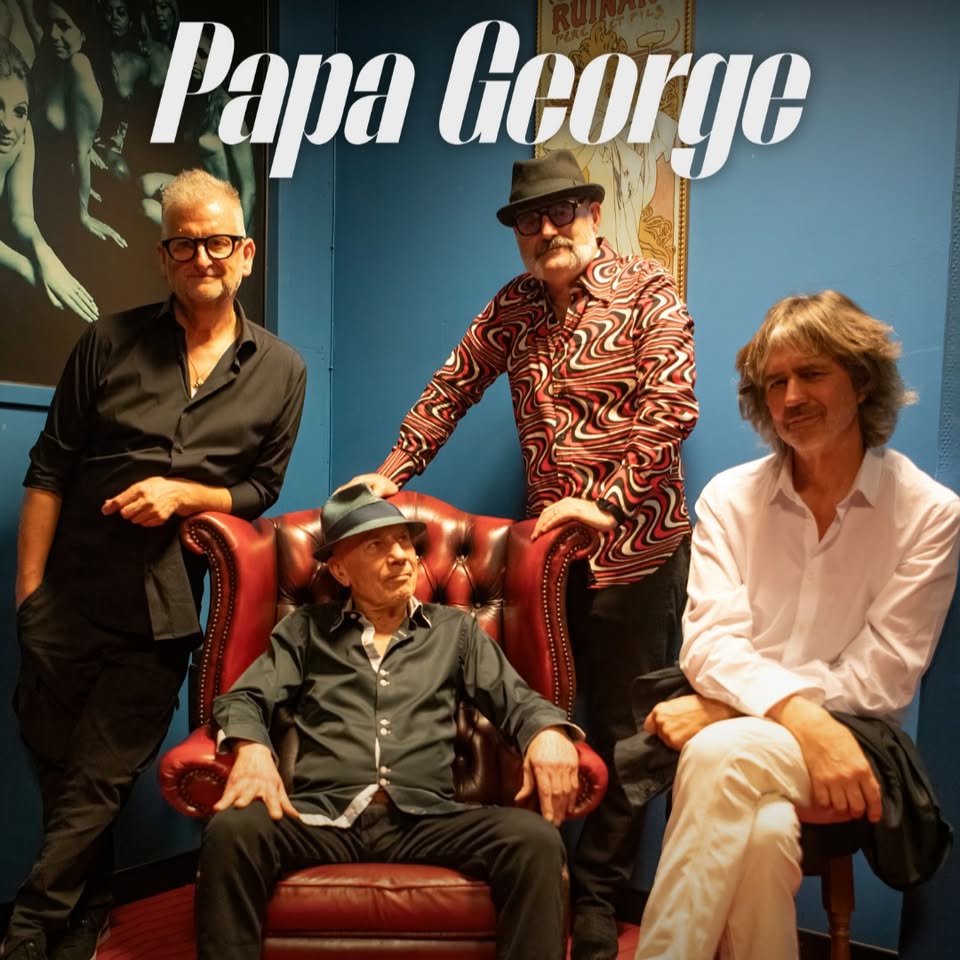 Papa George Potrebbe essere un'immagine raffigurante chitarra e il seguente testo "Papa Gcorye"