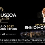Omaggio a Morricone – 2 Gennaio 2027 BRINDISI Teatro Impero | Orchestra Tebaide Potrebbe essere un'immagine raffigurante il seguente testo "ORO HESTR ORCHESTHATEBAIDE TEBAIDE CINEMUSICA il Gran Gala 02 GENNAIO 2027 BRINDISITEATRO IMPERO BIGLIETTISU ticketone AR WWW.ARLIVE.IT OMAGGIOA A ENNIO MORRICONE CORO E ORCHESTRA SINFONICA TEBAIDE D' ITALIA ARRANGIAMEN DIREZIONE COSIMO MARAGLINO SCENEGGIATURA: RAFFAELLA BALESTRA"