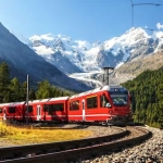 TRENINO ROSSO DEL BERNINA & SOGGIORNO A LIVIGNO Potrebbe essere un'immagine raffigurante treno e ferrovia