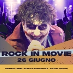 Rock In Movie @ Carabattole Love Park Potrebbe essere un disegno raffigurante il seguente testo "ー時人 BATTOLE LOVEPARK LOVE PARK ROCKIN IN MOVIE 26 GIUGNO INGRESSO LIBERO PARCO CARABATTOLE- AGLIANA (PISTOIA)"