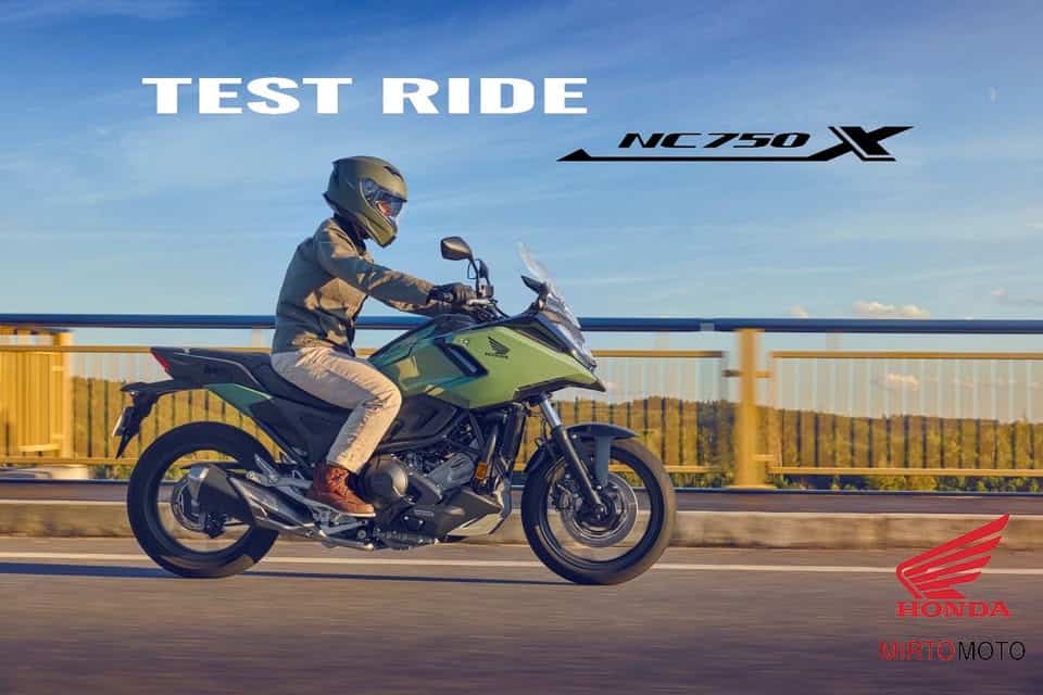 TEST RIDE HONDA NC750X DCT Potrebbe essere un'immagine raffigurante motocicletta, moto da cross, scooter e testo