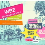 Why Bio Experience con Savona Senza Glutine • Il Festival dal 22 al 24 Maggio 2026 Potrebbe essere un contenuto di pop art raffigurante una o più persone e il seguente testo "A WhyBioExperience WBE AVAOV WhyBioExperience 2026 maggio SAVONA festival festivaldiffuso diffuso 手暖品 esperienze, emozioni esperienze,emozionie..sorpr e... sorprese! SAVONA SENZA GLUTINE νΕΝ DEL GLUTEN FREE corso Italia 22-24 MAGGIO AiC AiC Ingresso IngressoGratuito Graturto berganat"